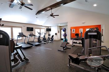 24-Hour club inspired fitness center including cardiovascular and weight equipment